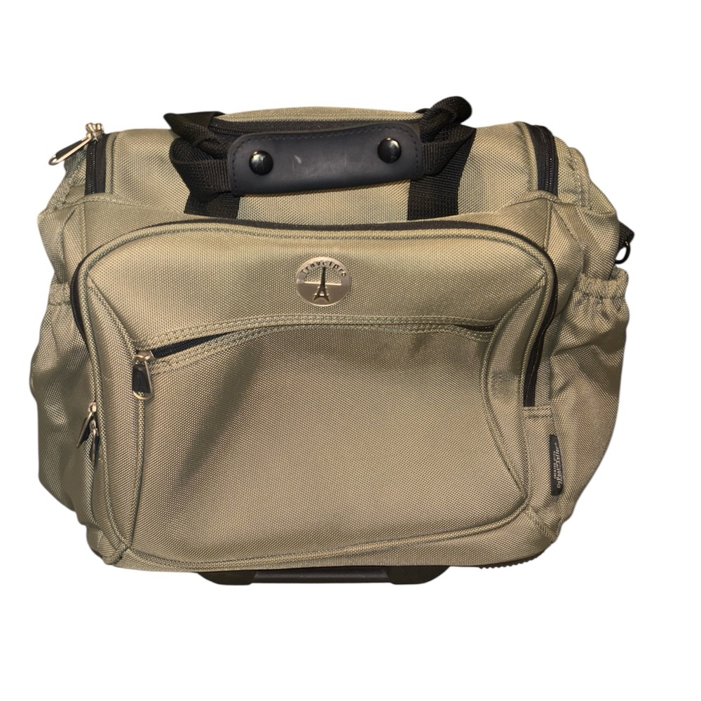 An used Tan Carry-On Luggage with Durable Design and Organized Storage
